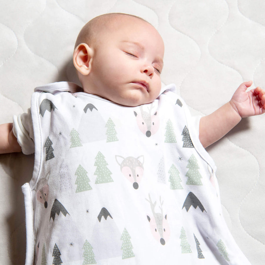 Baby sleeping using sleeping bag