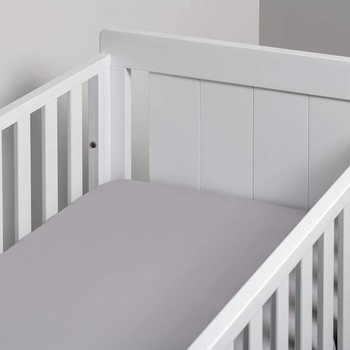grey fitted sheet in cot bed