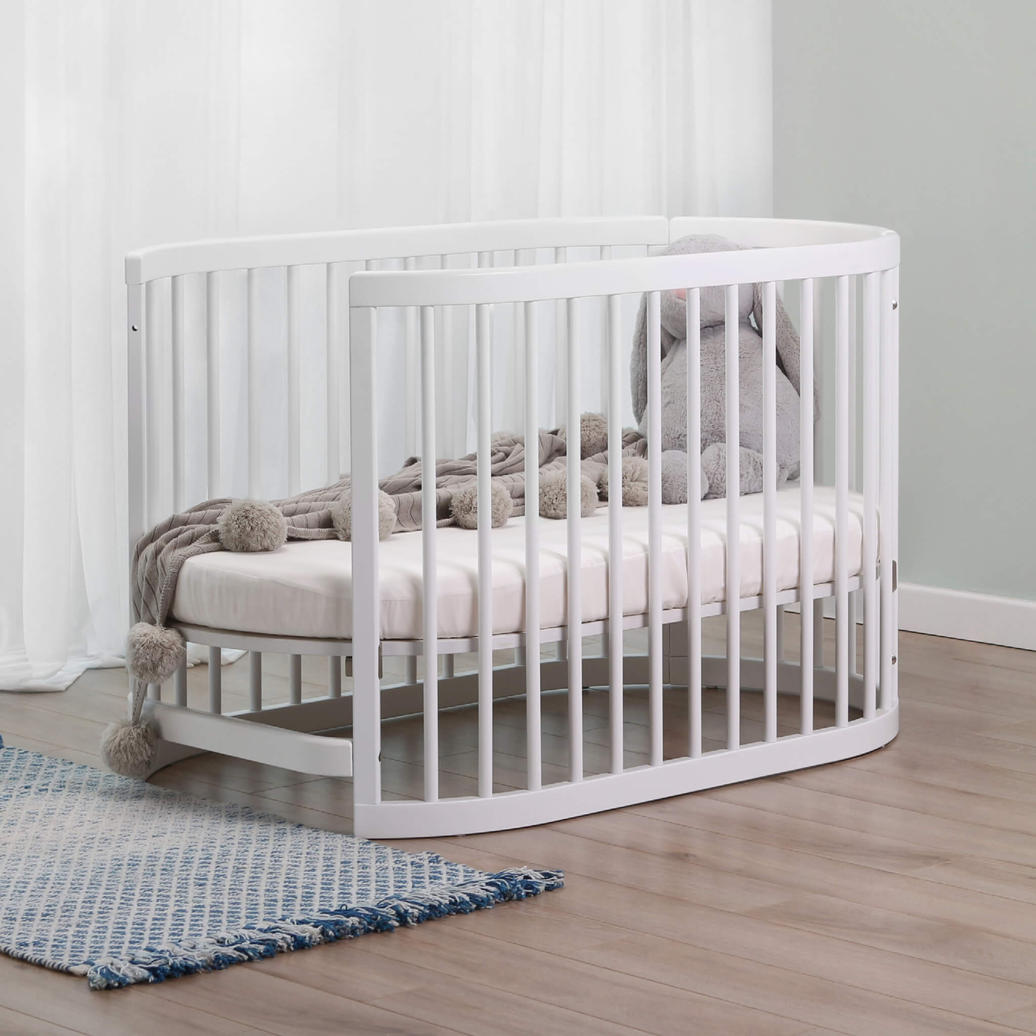 Oval baby hot sale cribs for sale