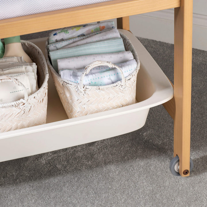 Tidy Bassinet with baby clothes
