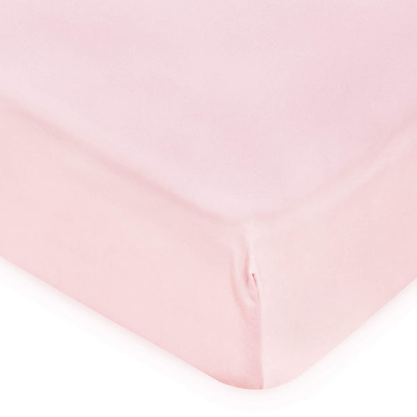 corner of pink cot bed fitted sheet